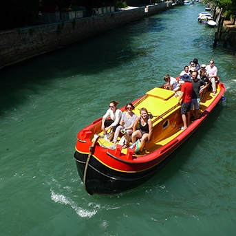 Students in a boat in Venice